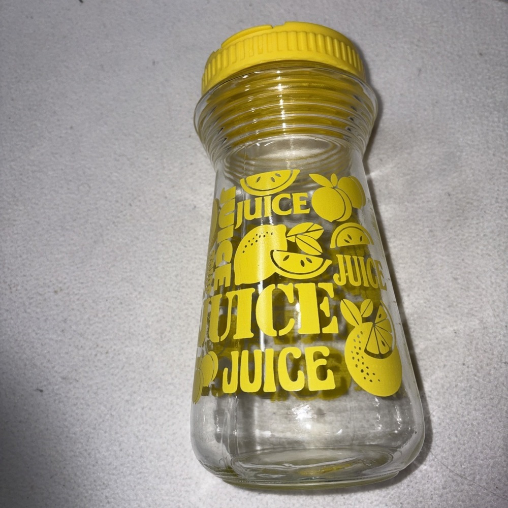 Collectible Glass Juice Container w Lid Yellow Script Measures 24 Fluid Ounces